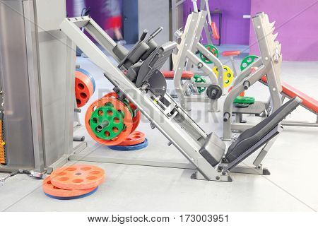 The image of wights in a fitness hall