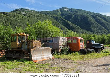 Old special machines in brookvalley Spokoyny at the foot of outer north-eastern slope of caldera volcano Gorely.