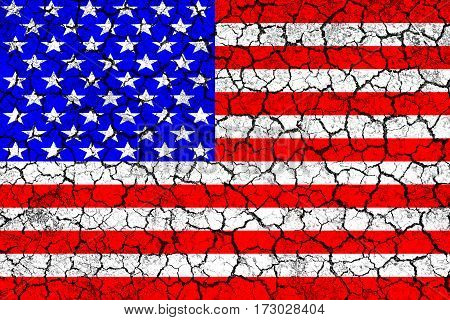 Flag of USA painted on cracked wall. Political concept. Old texture. Vintage design. USA flag on cracked earth. Famine and drought. Natural disaster. Front view.