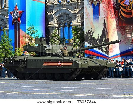 MOSCOW - MAI 9:  -  Newest russian main tank  t-14 with uninhabited tower based on the universal track 