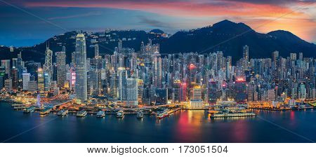 Hong Kong Island from Kowloon 101 building sunset backgroung