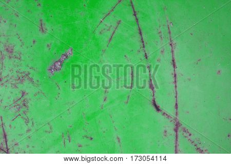 Green rusted metal background and texture. Green grunge old rusty scratched surface texture. Background - old metal surface. Abstract background and texture for designers.