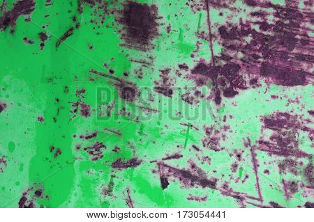 Green rusted metal background and texture. Green grunge old rusty scratched surface texture. Background - old metal surface. Abstract background and texture for designers.
