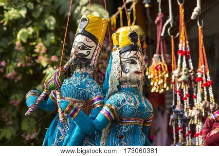 hanging of tradition india doll in display shopfront in Dilli Haat Delhi India. Dilli Haat is traditional marketplace in delhi