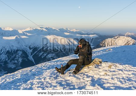 Chilled Hiker Drink Hot Tea From A Thermos.
