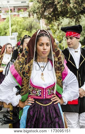 SELARGIUS, ITALY - September 13, 2015: Former marriage Selargino - Parade of a beautiful girl in the folk group San Biagio di Villasor - Sardinia