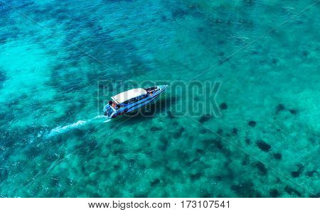 Speed boat in the sea.Aerial view. Top view.amazing nature background.The color of the water and beautifully bright.