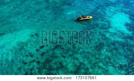 Speed boat in the sea.Aerial view. Top view.amazing nature background.The color of the water and beautifully bright.