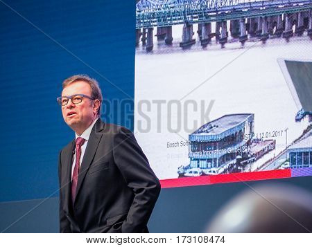 MUNICH GERMANY - FEBRUARY 16 2017: Bosch Software Innovations CEO Rainer Kallenbach delivers an address to IBM Genius of Things Summit in Munich Germany on February 16 2017.