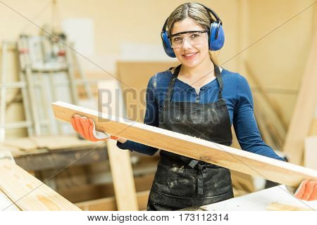Young Woman Working As A Carpenter