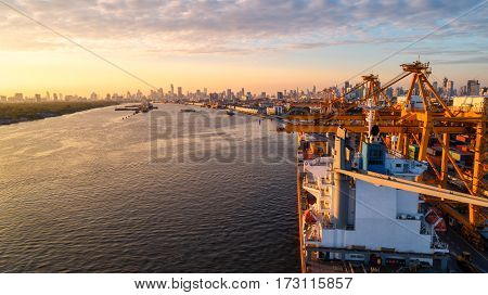 container ship in import export and business logistic.By crane Trade Port Shipping.cargo to harbor.Aerial view.Water transport.International.Shell Marine.Top view.