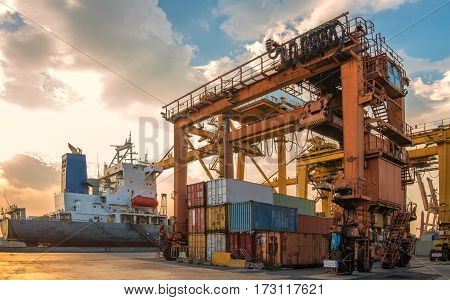 container ship in import export and business logistic.By crane Trade Port Shipping.cargo to harbor.Aerial view.Water transport.International.Shell Marine.Top view.