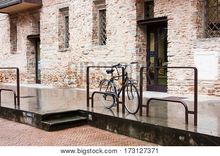 FIRENZE ITALY - February 06 2017 : Bicycle near old wall on a street in Firenze