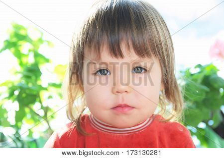 Child portrait with neutral facecaucasian little gril unemotional face