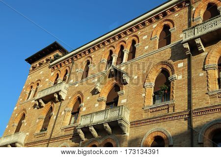 Antique Brick Building With A Little Tower
