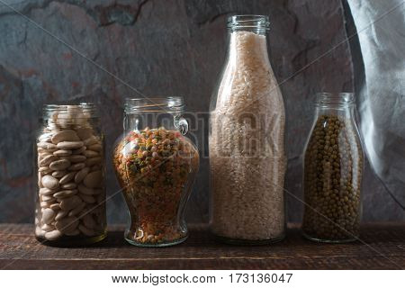 Banks with beans and lentils, rice in line horizontal