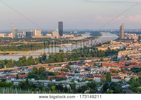 VIENNA AUSTRIA - 7TH MAY 2016: Part of the Vienna Skyline from kahlenberg showing buildings bridges and the River Danube.