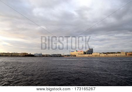 View of center of St Petersburg at evening. Arsenal embankment Vyborg side and Sampson bridge.