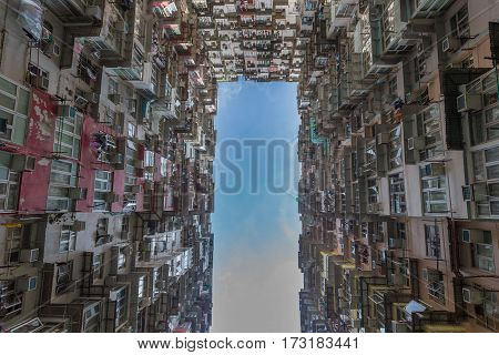 Hong Kong citt apartment from bottom view cityscape background
