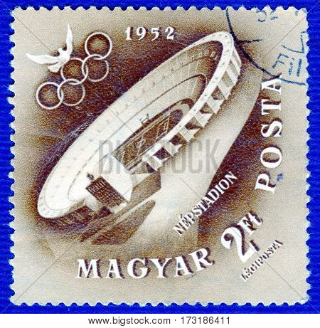 HUNGARY - CIRCA 1952: Postage stamp printed in Hungary  with a picture of a stadium where the event took place, from the series 