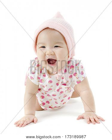 Portrait of full length beautiful Asian baby girl in pink clothes crawling on floor, isolated on white background.