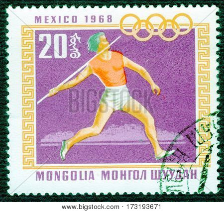 MONGOLIA - CIRCA 1968: Postage stamp printed in Mongolia  with a picture of a athletics (javelin-throwing), from the series "Mexico 1968". circa 1968