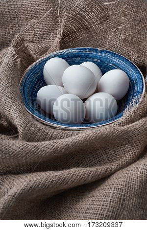 Ecological natural fresh eggs collected in the plate for cooking
