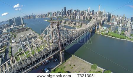 Queensboro Bridge at summer sunny day in New-York City. Aerial view
