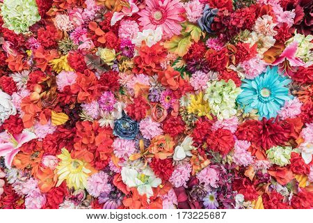 Floral colored background. Many flowers arranged in the substrate. The concept of color structure flowers. Beautiful flowers background for wedding scene