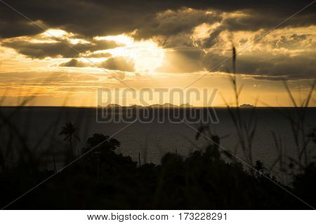 Panoramic sunset by the sea from island Koh Phangan with Ang Thong Marine Park in background Thailand
