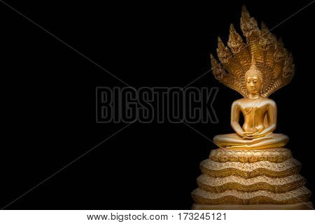 Golden Nak Prok Buddha isolated black background