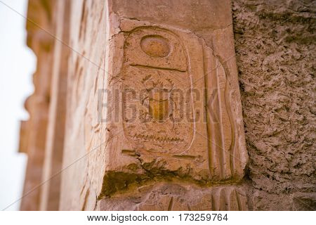 LUXOR, EGYPT: Ancient ruins of Karnak temple in Egypt at noon. The complex is a vast open-air museum, and the second largest ancient religious site in the world