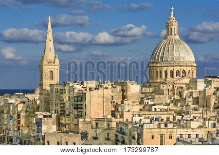 Valetta overview. View of a church dome over the roofs of Valetta