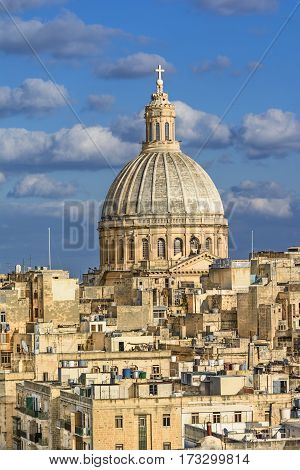 Valetta overview. View of a church dome over the roofs of Valetta