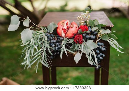 Autumnal Wedding Bouquet Of Roses, Apples, Grape And Pomergranate, In Red Colour, Closeup