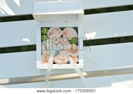 Wedding Gift Casket Decorated With Bow And Buds On White Background