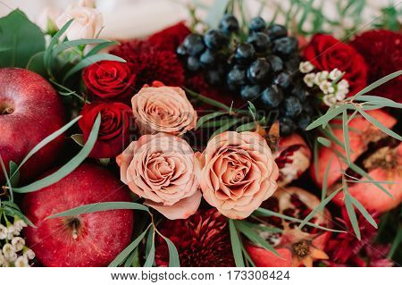Autumnal Wedding Bouquet Of Roses, Apples, Grape And Pomergranate, In Red Colour, Closeup