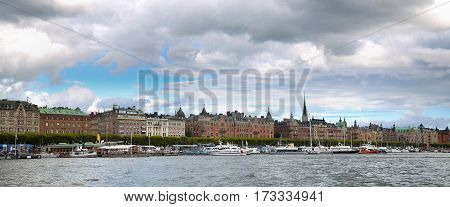View on Strandvagen street on Ostermalm distric with touristic sightseeing boats in Stockholm Sweden