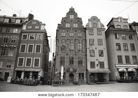 STOCKHOLM SWEDEN - AUGUST 20 2016: Cafes and restaurants at the Stortorget square(Gamla Stan).Stortorget is one of the most important squares in the Old Town in Stockholm Sweden on August 20 2016.
