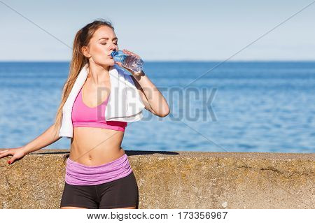 Woman Drinking Water After Sport Gym Outdoor