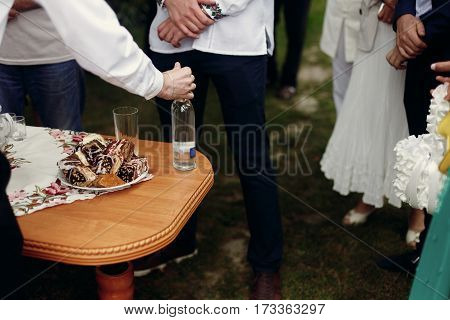 Traditional Ukrainian Wedding Table For Guests Before Ceremony, Stylish Man Drinking And Toasting Vo