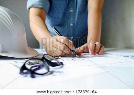 Close Up Man Working Of Architect Sketching A Construction Project On His Plane Project At Site Cons