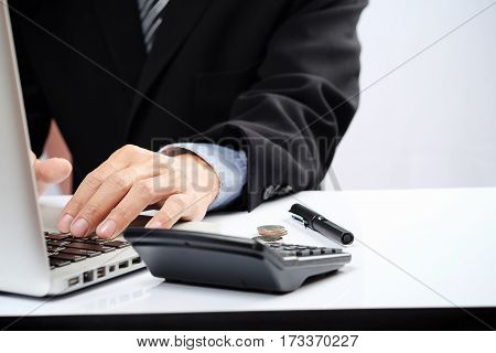 Business Man Hand Pointing At Business Document During Discussion At Meeting