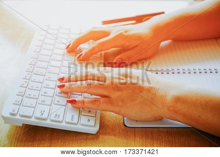 Close Up Of Hands Typing On Computer Keyboard