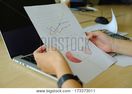 Close-up Business Analysis Of Graphs And Charts