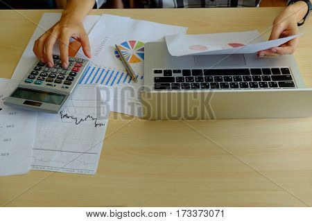 Business Man Hand Pointing At Business Document During Discussion At Meeting
