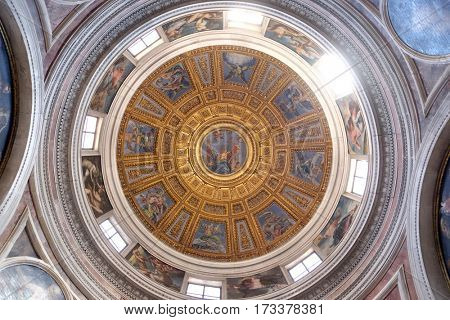 ROME, ITALY - SEPTEMBER 02: The cupola in Chigi chapel designed by Raphael, painting of the creation story by Francesco Salviati in Church of Santa Maria del Popolo, Rome, Italy on September 02, 2016.