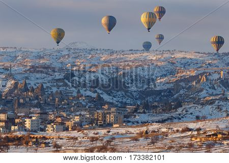 Cappadocia, Turkey - January, 20th, 2017 - hotfire balloons festival winter morning cappadocia turkey