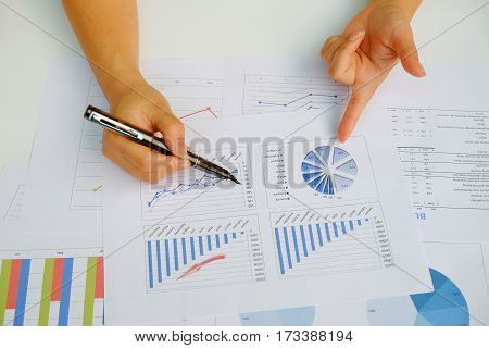 Asian business meeting dicuss analysis report view from top. concept of business analysis data analysis.