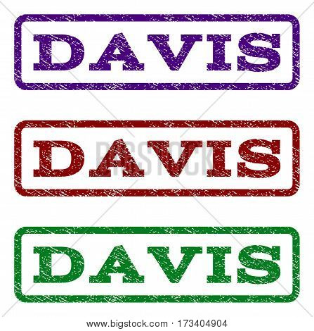 Davis watermark stamp. Text caption inside rounded rectangle frame with grunge design style. Vector variants are indigo blue red green ink colors. Rubber seal stamp with dust texture.